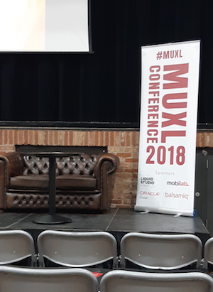 A conference banner with the words 'MUXL conference 2018'