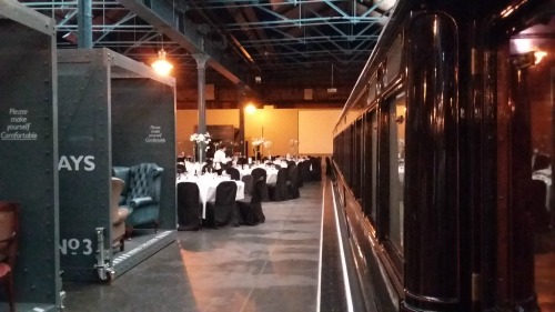 Photo of the dinning tables set between 2 trains